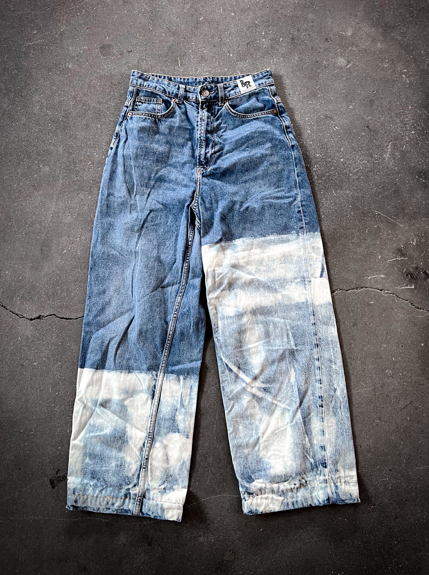 Asymmetrical Bleached Jeans